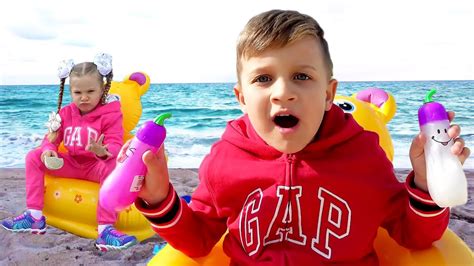 diana and roma video|Diana and Roma play on the Beach with Dad .